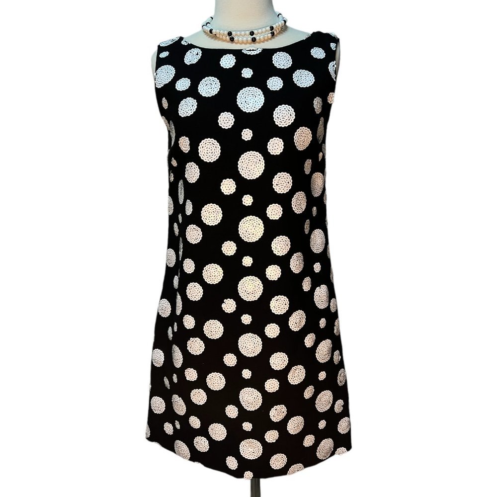 Adorable short black dress with white sequin circles
